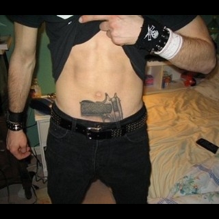 Gun Lower Stomach Tattoo